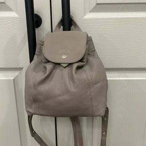 Mini backpack in grey color